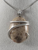 Indonesian Fossilized Coral Stone Handmade Pendant Wrapped in Silver