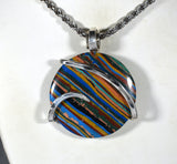 Fordite Pendant Hand Wrapped in Silver
