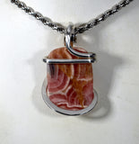 Rhodochrosite Crystal Stone Pendant  Hand Wrapped in Silver