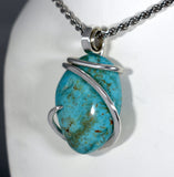 Turquoise Fox Stone Pendant Hand Wrapped in Silver