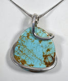 Turquoise Fox Stone Pendant Hand Wrapped in Silver