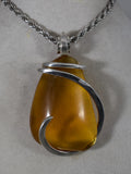 Amber Fossilized Resin Pendant Hand Wrapped in Silver